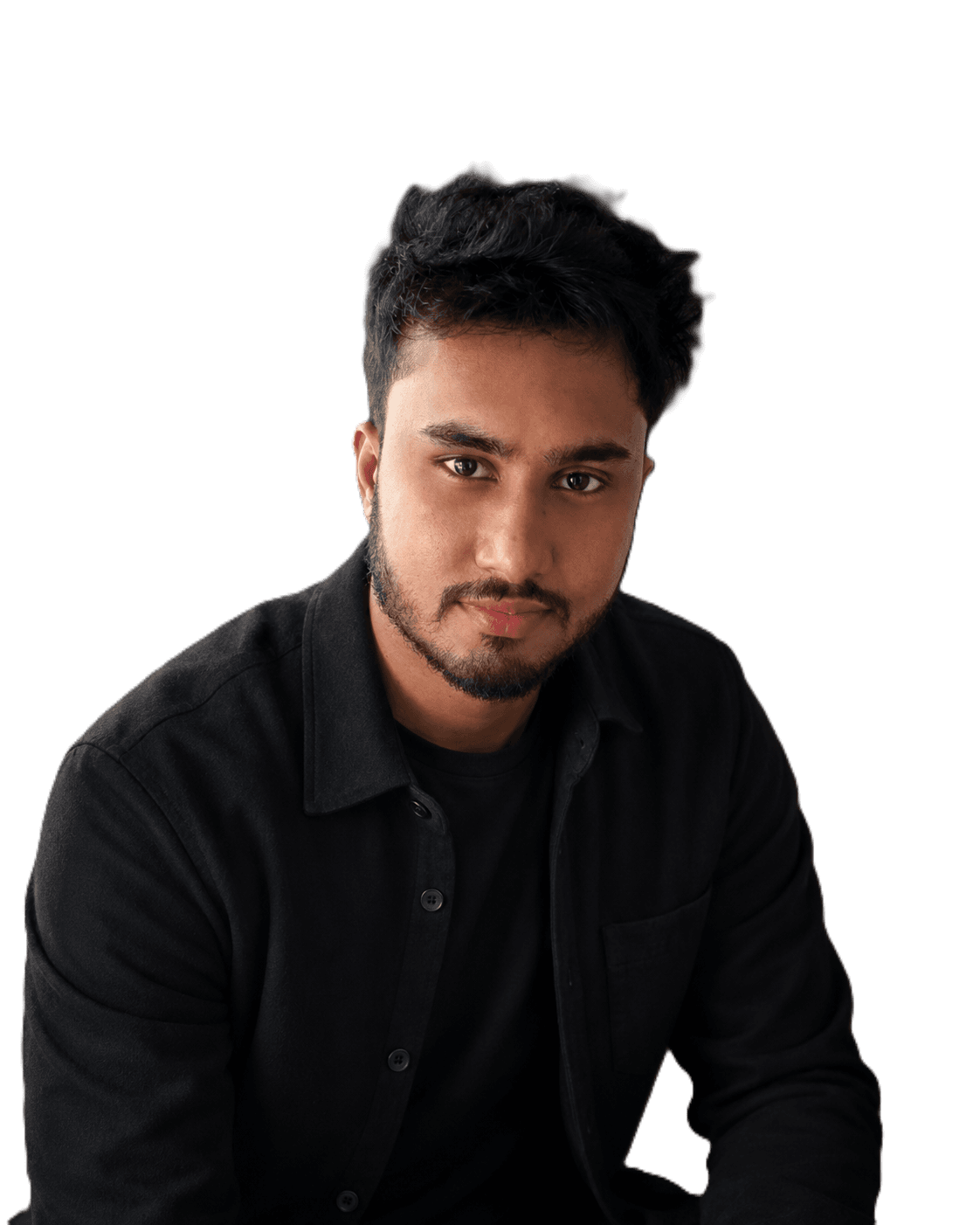 Irosha Hewage, software engineer and founder of Devoscape, photographed against a dark studio backdrop